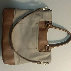 Tiganello Brown and Gray shoulder purse with strap.